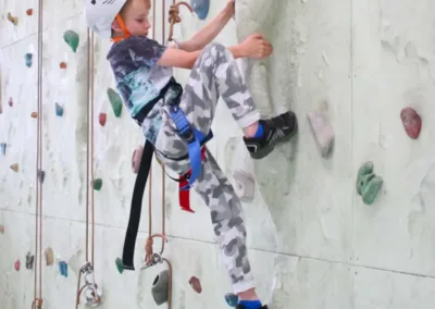 child on indoor climbing wall