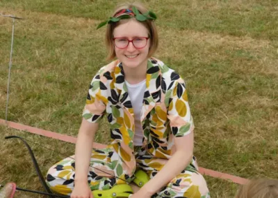 Female teenager on a field in summer