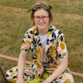Female teenager on a field in summer