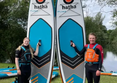 Young adults with Stand up Paddle Boards