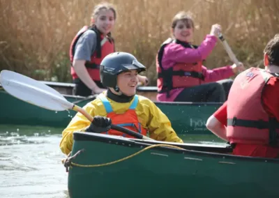 People having fun on a canoe