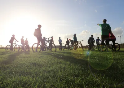 Group of cycling teens on a field in Oxfordshire