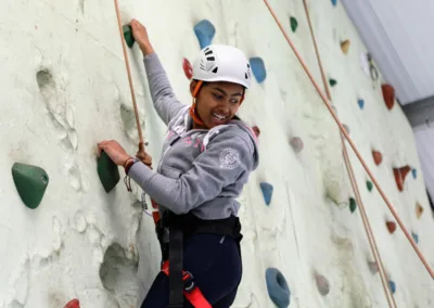 A teenager on indoor climbing wall