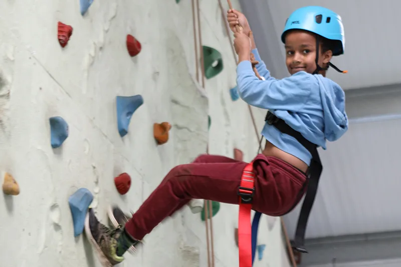 Climbing TA Easter Child on indoor climbing wall