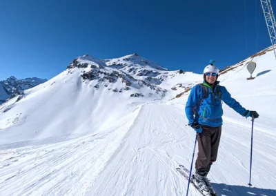 Skier with GoPro with big blue sky