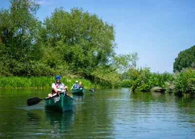 Parent and child in a canoe on Thames