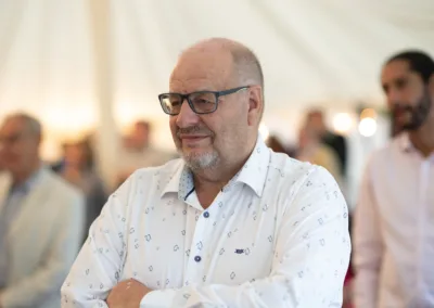 Smiling gentleman wearing glasses