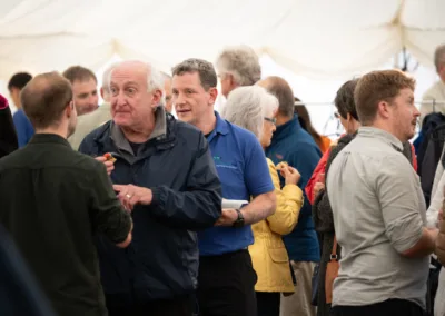 Crowds mingling at social gathering