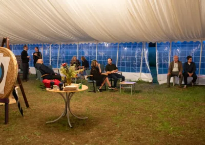 People in a large marquee