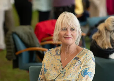 mature lady smiling at the camera