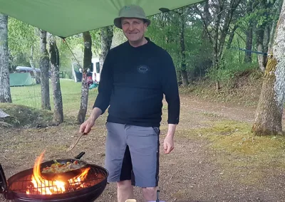 Man cooking on an open fire